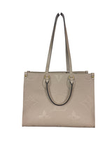 Louis Vuitton OnTheGo MM Monogram Empreinte Leather Tote Bag