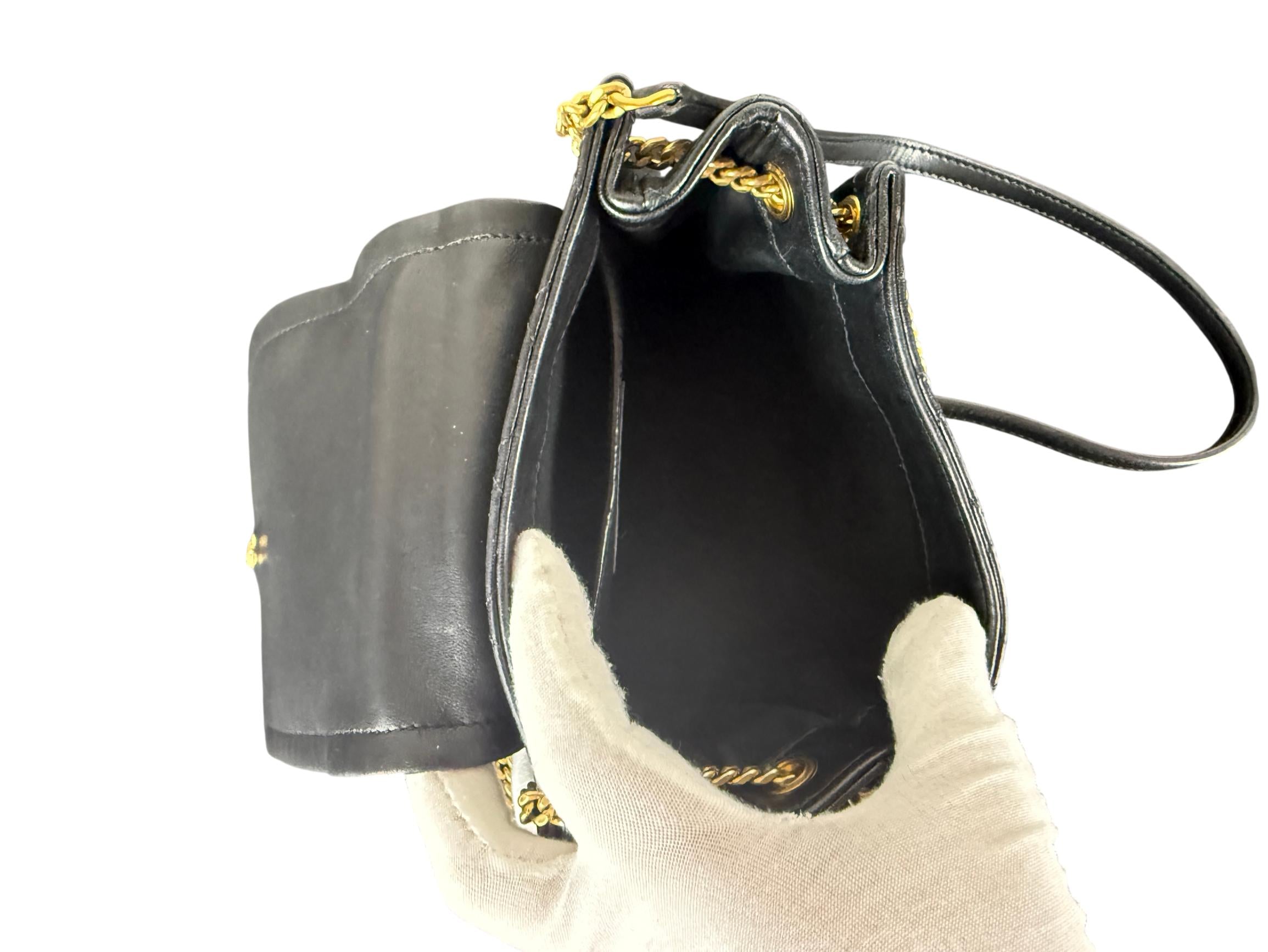Yves Saint Laurent Lambskin Quilted Monogram Mini Nolita Bag