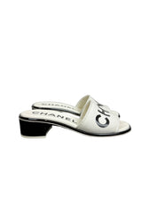 Chanel 24C White & Black Logo Mule Slide Sandals